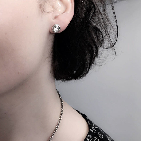 Silfureyrnalokkar með zirconia