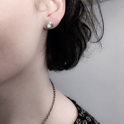 Silfureyrnalokkar með zirconia
